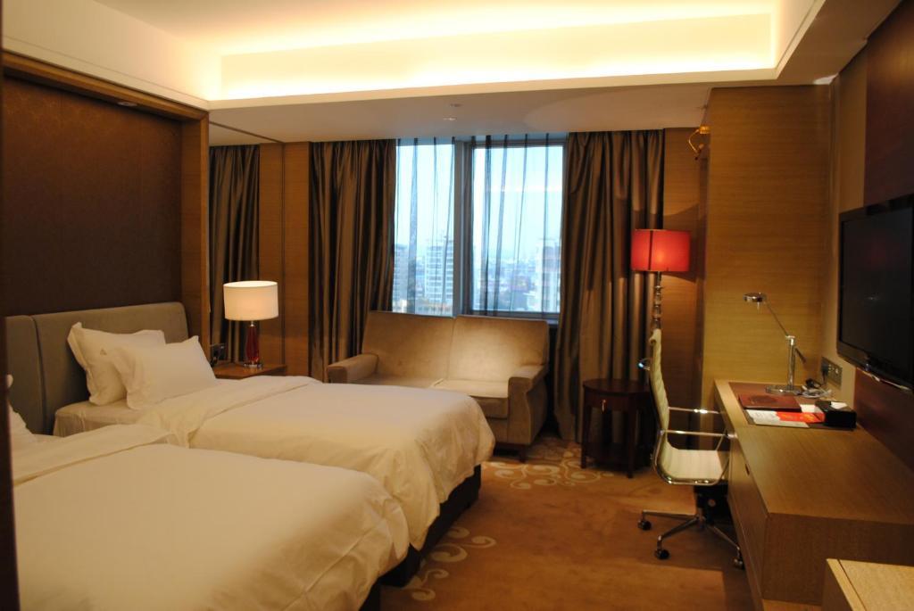 Guangzhou New Century Hotel Habitación foto
